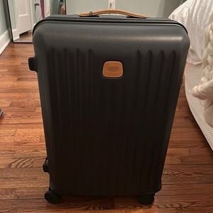 Brand new Bric’s luggage with dust bag.